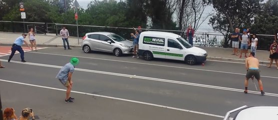 Aussie Policeman Joins an Impromptu Game of Street Cricket