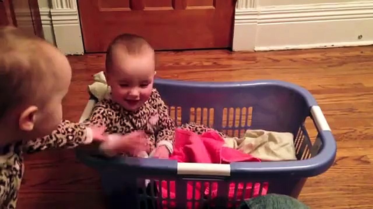 Twin Babies Talking in a Laundry Basket