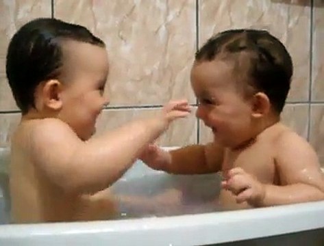Twins Brothers Enjoying Bath Time