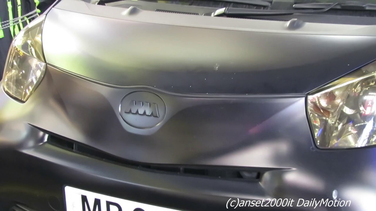 Toyota IQ Tuned and All Black. Seen in Mong Kok, Hong Kong. "MR 999" Licence