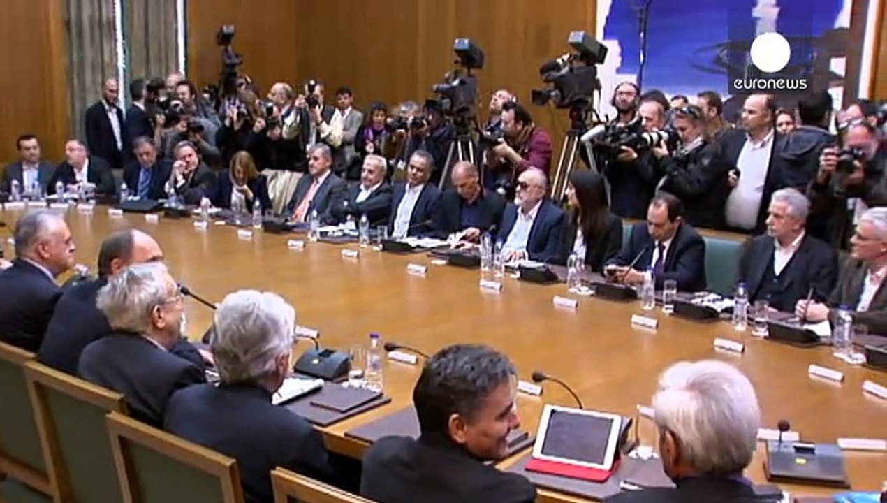 PM Alexis Tsipras tells first cabinet meeting: 'Greece will not default'