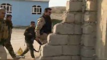 Syrian and Iraqi Kurds battle ISIL in Sinjar