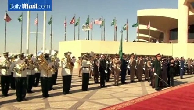 Barack and Michelle Obama back in US after Saudi Arabia as the First Lady's outfit is analyzed