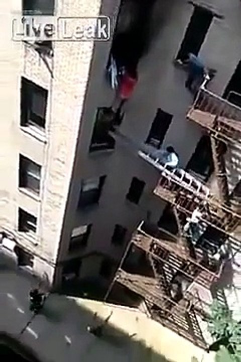 Man saving the life of his neighbor from a building which caught fire