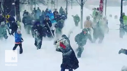 New Hampshire residents hold giant snowball fight
