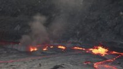Drum of water into Erta Ale lava lake