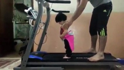 Little champ on tread mill.