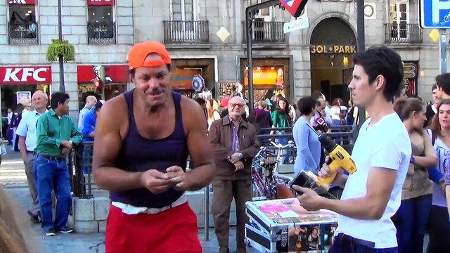 Street performer displays insane rotating drill stunt