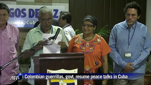 Colombian guerrillas, government resume talks