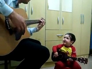 Amazing! Young Kid playing guitar