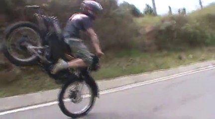 Stunts   Crazy Balance Point Stoppie From A Hill