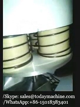 volumétrique tasse dosage remplissage vertical et la machine d'emballage d'étanchéité