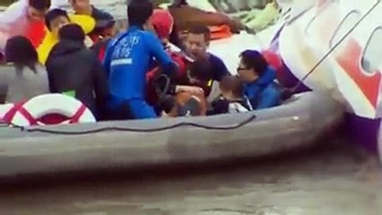 TransAsia crash Amazing footage shows toddler rescued alive from wreckage