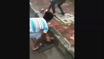 Guys Catching Fish In Manhole - Catching Fish On Street