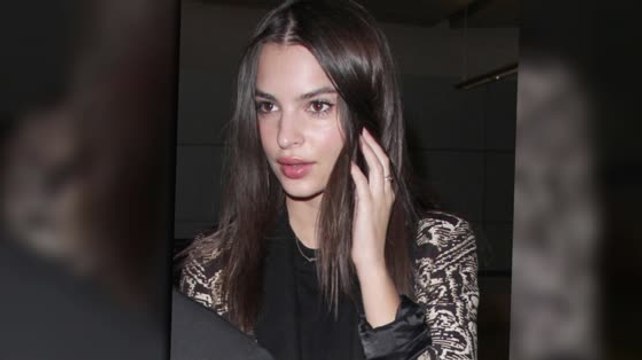 Emily Ratajkowski Covers Up Her Famous Figure Jetting Into LAX
