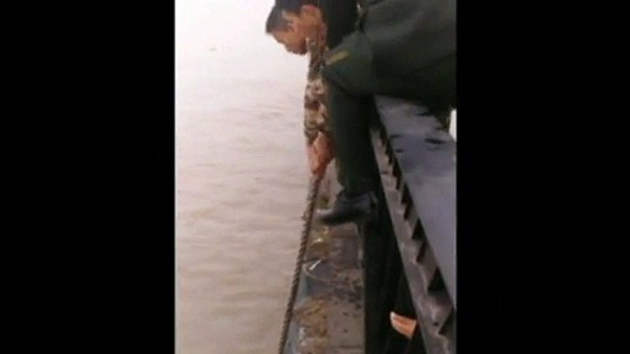 Soldiers rescue woman who jumped into river