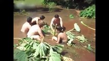 Brazilian Men, Kid Sucked Under Water Cleaning a Drain Hole In The Middle Of The Road (VIDEO)