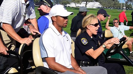 Woods pulls out with back injury