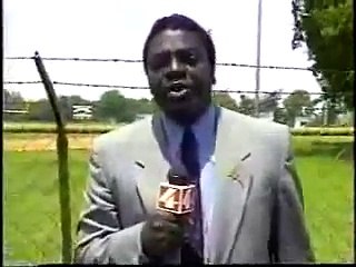 Fly flies in news reporter mouth during reporting