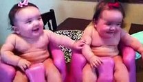 Twin babies laughing, crying, and then laughing again