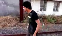 Guy committing suicide on railway track.