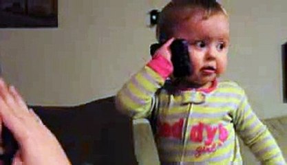 Baby Talks to Dad on Phone