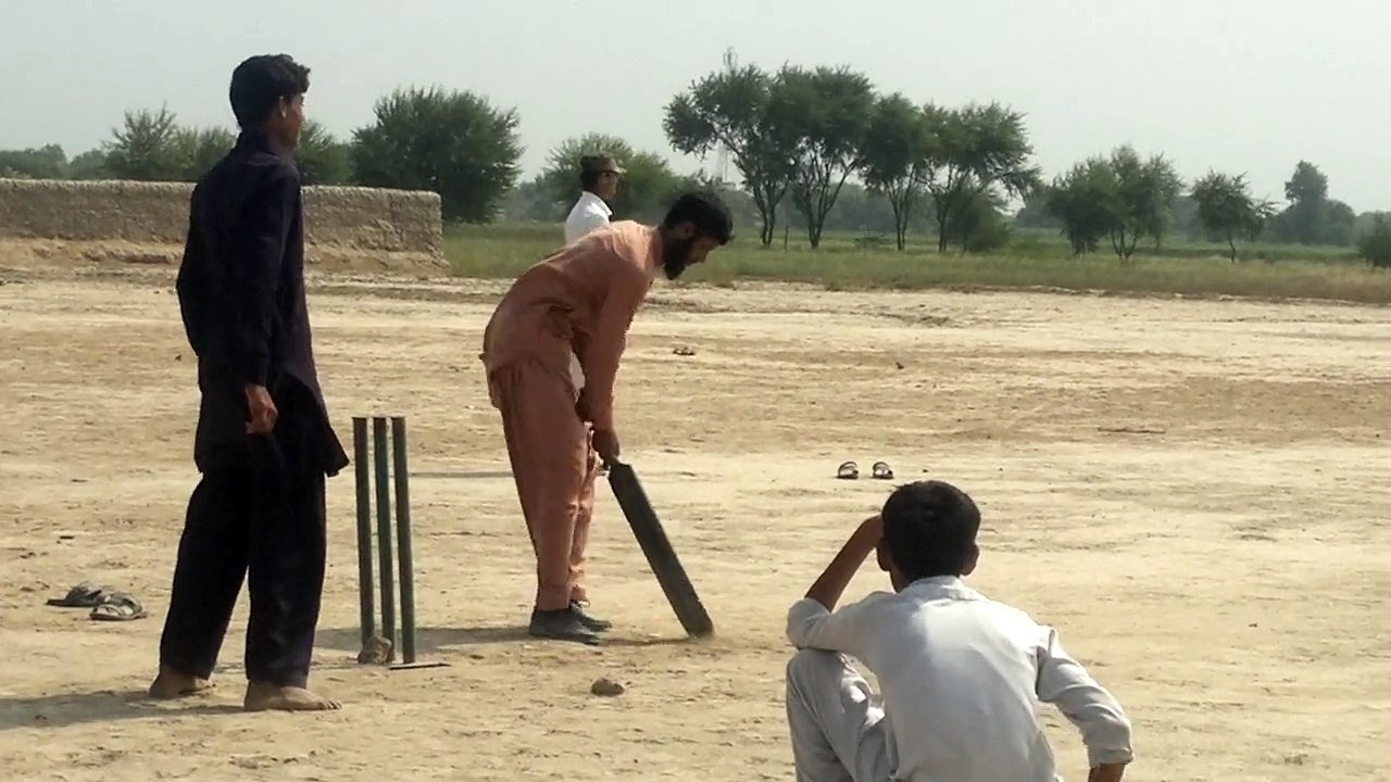 playing cricket