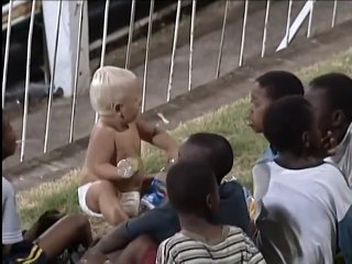 A Baby show us how to UNITE at a Cricket Match in South Africa 2003