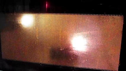 Microwaving two broken battery testers due to them being worn out and fried