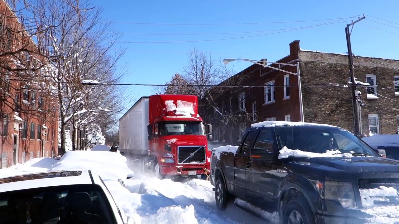 Ford F150 SUV Tows a giant Semi Truck During Chicago Blizzard! Impressive