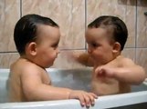 Twins Brothers Enjoying Bath Time