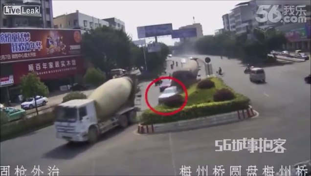 LiveLeak.com - BMW Sandwiched by Two Cement Trucks Results in Two Deaths