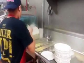 Holy Dishes! Is this Man the world's Fastest Dishwasher?