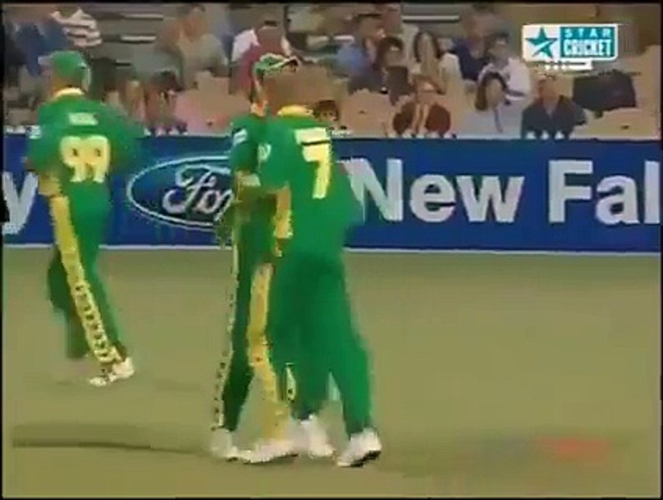 Pollock bear hug Aleem Dar after taking wicket