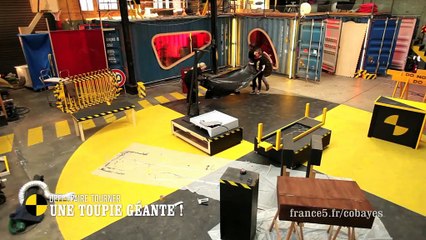 EM128 Défi : faire tourner une toupie géante !