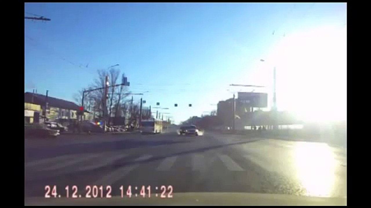 Bus Crashes into Car