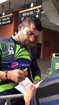 Umar Akmal giving Autograph with His Lucky Number 3
