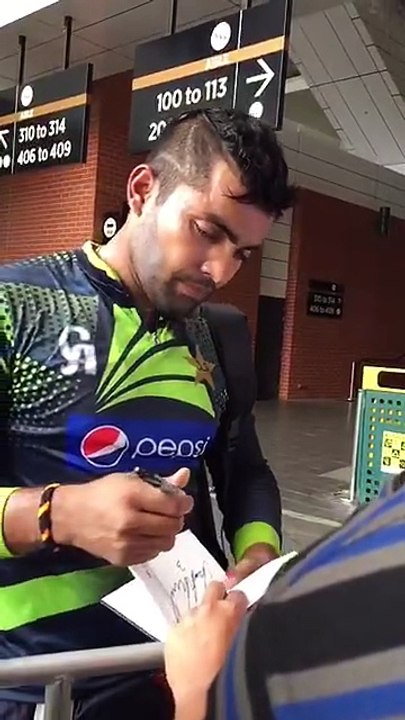 Umar Akmal giving Autograph with His Lucky Number 3