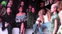 Kim Kardashian holds baby North with Beyonce watching her and many A list stars all watching Kanye West's first Addias collection NYC