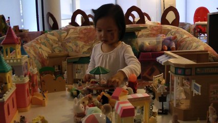 Girl And Sylvanian Families