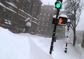 Man Takes to Boston's Snow-Covered Streets