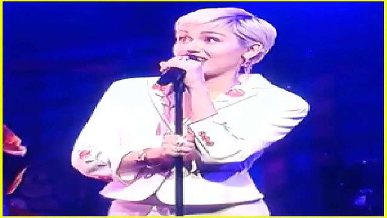 Miley Cyrus Covers Paul Simon on 'SNL 40' - Watch Now!
