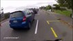 The road isn't a rubbish bin! Motorcyclist throws trash back in car _ Daily Mail Online