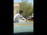 Kid locks himself out of a moving car : FAIL