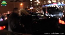 Kanye West and Kim Kardashian arrive home after a day of shopping in NYC and are asked about Joe Jonas Ugg boot-Yeezy fake