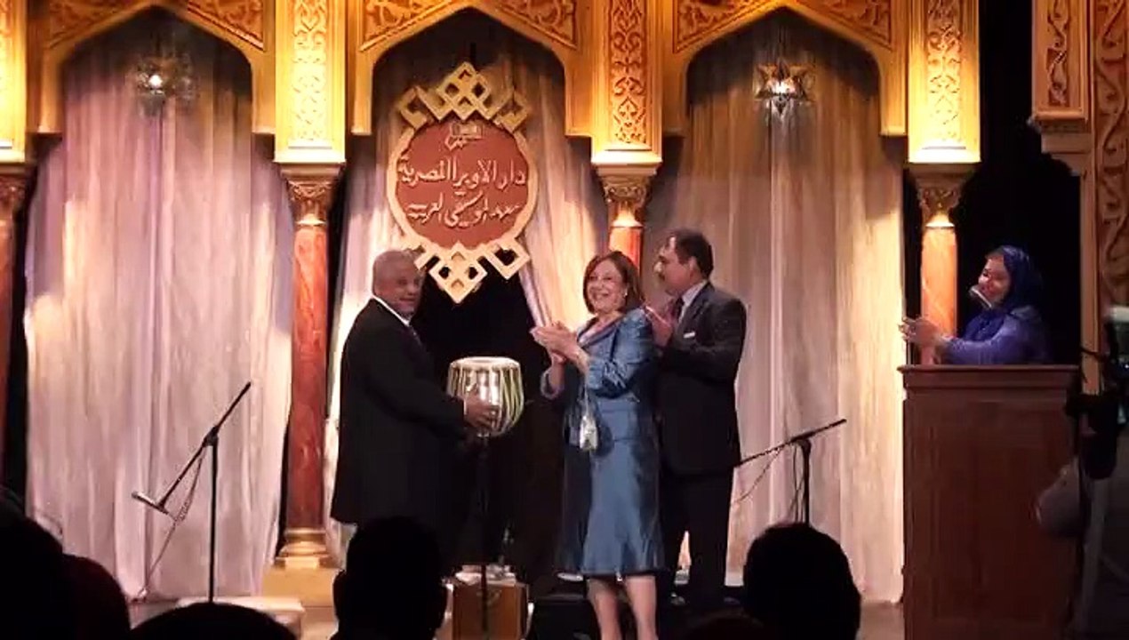 Marifat Sufi Band in Egypt-Egyptian Culture Secretary presenting flowers to lead singer Dr. Zafar Iqbal