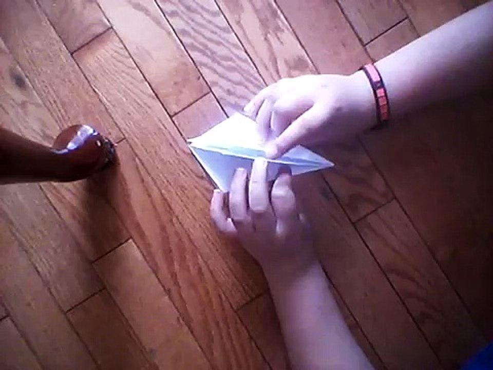 Folding origami scorpion (Robert harben)