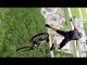 Downhill Mountain Biker Throws Himself Off A Cliff