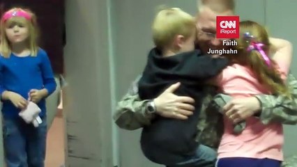 Kids give their military dad the longest hug