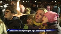 Tens of thousands in Copenhagen vigil for shooting victims